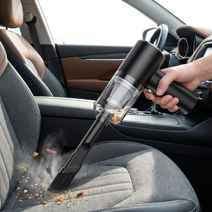 Wireless car vacuum cleaner in use on a car seat interior