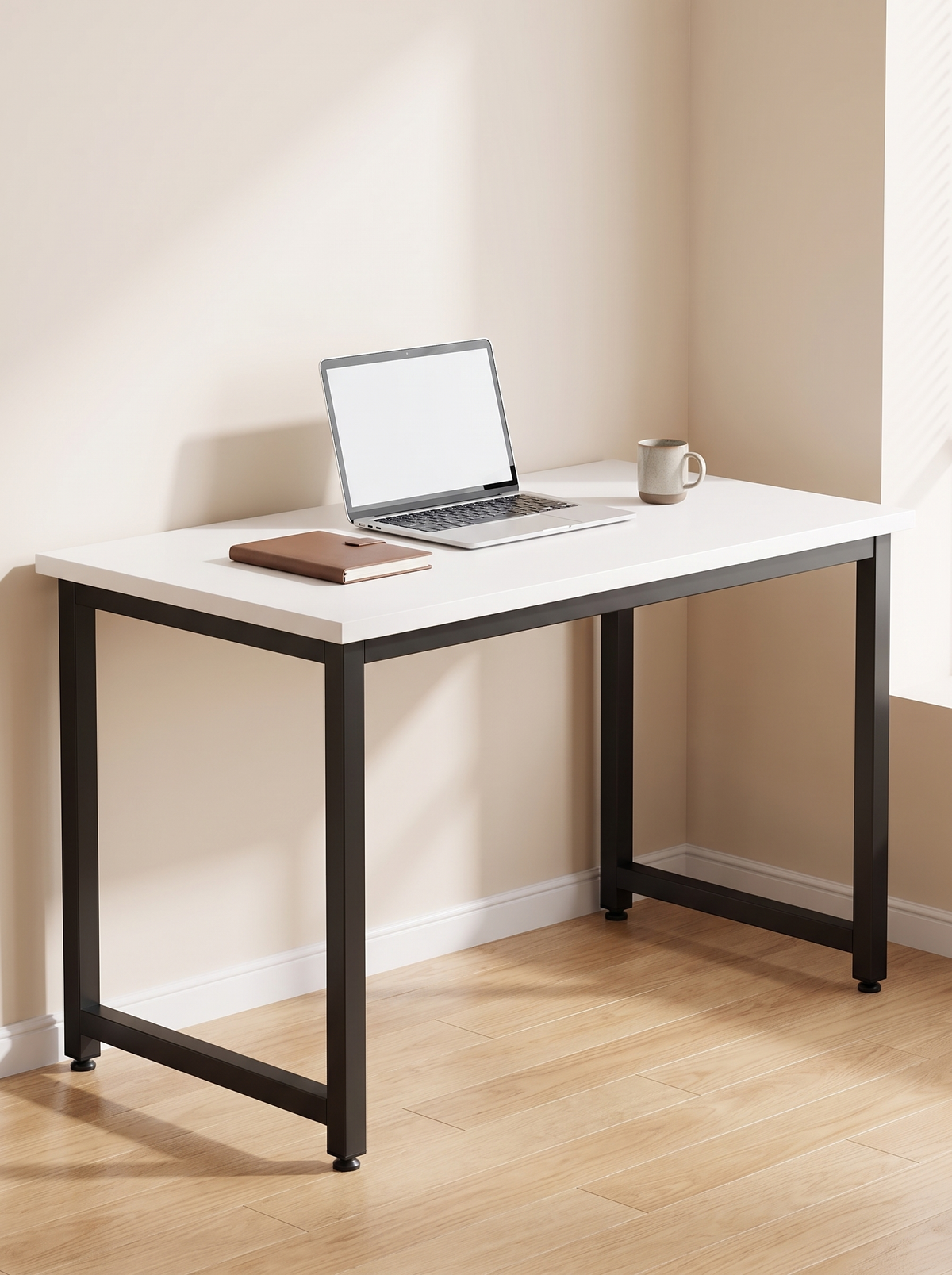 White topped desk on a black metal frame standing level in a bright study corner with four clean legs